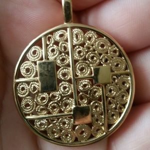 Sarah and Co gold tone stamped pendant